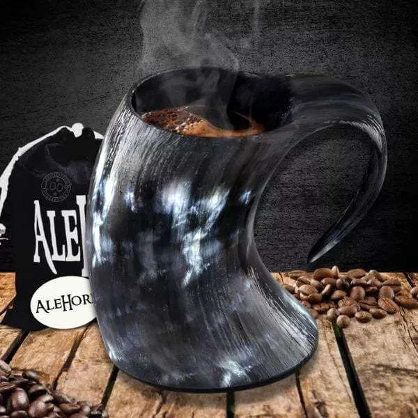 The Hot Coffee Drinking Horn is an accessory for Valhalla-based ale drinkers, who enjoy their horn of choice with caffeine. The Viking coffee vessels feature a long handle that allows you to drink your favorite hot beverage without scalding yourself on its boiling contents