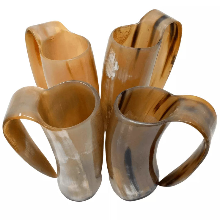 Set of 4 golden Viking tankards, handcrafted from natural and ethical Ox horn with shades of yellow and pearl. Sealed with food-safe FDA-approved sealant for a safe and stylish beer drinking experience. Perfect for sharing with friends or as a unique addition to your home bar collection.